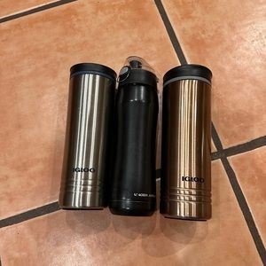 2 Random mugs, under armor water bottle.  Used but in good condition.